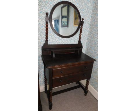 A bobbin turned oak dressing table, 76cm wide. 