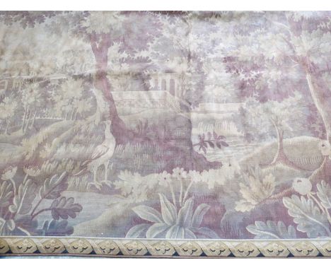 A large 20th Century tapestry hanging depicting a classical garden view 