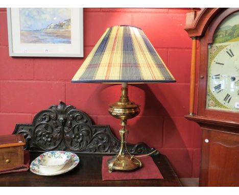 A late Victorian brass Art Nouveau lamp converted to electricity, presentation inscription to base, Benson style
