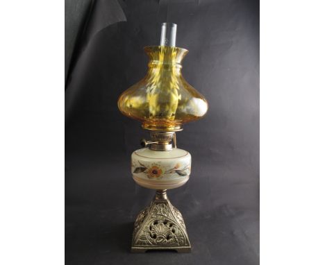 A late Victorian oil lamp fitted with a grade "A" Duplex burner, cream glass font decorated with handpainted flowers, complet