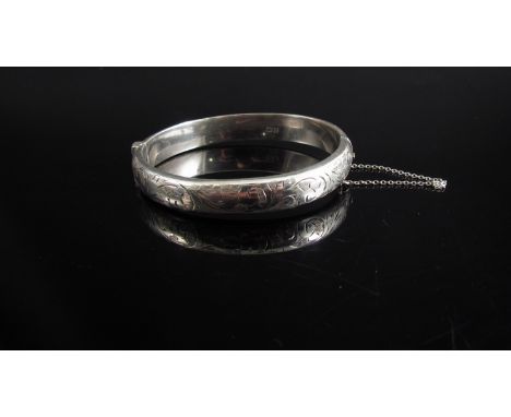 A silver engraved stiff hinge bangle, Chester