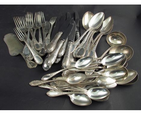 A large quantity of German silver cutlery, vacant cartouches, floral design terminals, including five dinner forks, five dinn