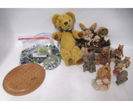 Merrythought teddy bear, various other dolls, quantity of marbles and various resin figures of bears