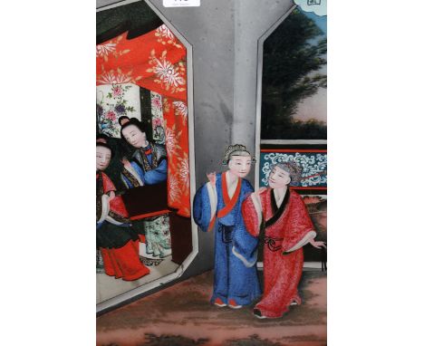 19th Century Chinese reverse painting on glass, figures in an interior, 49 x 34cm, housed in a hardwood frame