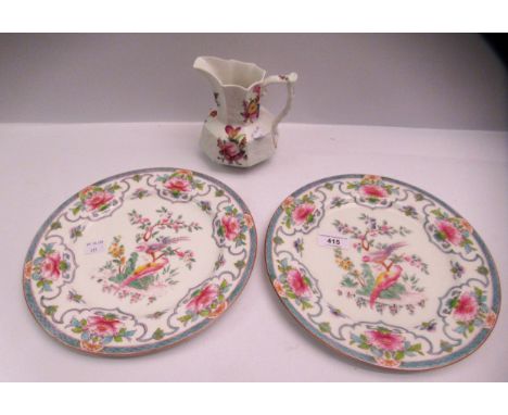 Pair of Worcester plates decorated with exotic birds and flowers, together with a Coalport Improved Feltspar porcelain jug wi