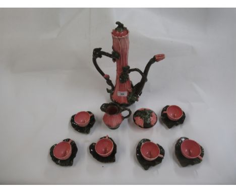 Zsolnay, unusual Lotus pattern coffee service comprising:  coffee pot, cream jug, sugar bowl and cover and six cups and sauce