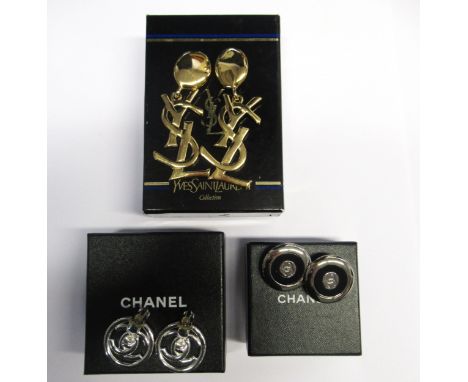 Two pairs of Chanel costume earrings in original boxes, together with a pair of Yves Saint Laurent costume earrings in origin