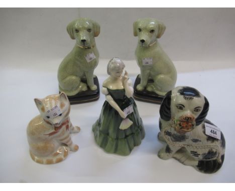 Staffordshire pottery figure of a seated dog, Rye pottery figure of a cat, a Royal Doulton figure and two reproduction potter