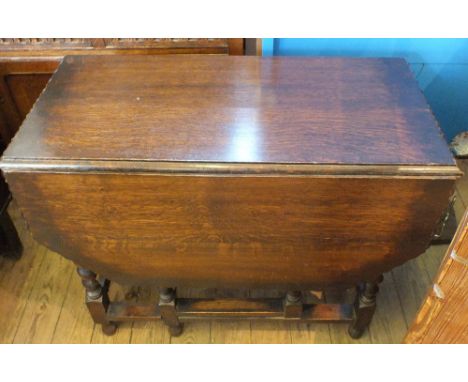 An Oak record cabinet, Oak barley twist gate leg table and a standard lamp