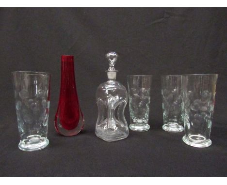 Whitefriars red cased glass vase, a Holmegaard clear glass decanter and a set of cut polished Danish glasses 