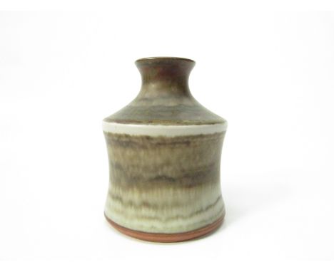A Hoganas of Sweden ceramic vase with a rippled dark oatmeal glaze. Incised to base John Anderson Atelje, 10cm high