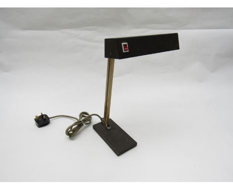 A painted metal desk lamp with adjustable brass arms 