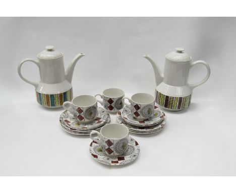Kathie Winkle, two 1970's coffee pots and a collection of cups, saucers and side plates in the rare Compass pattern 