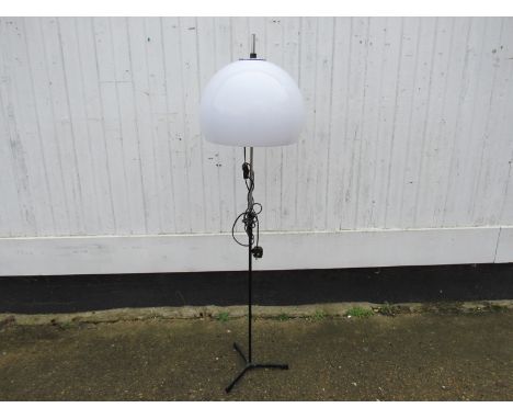 A painted and chromed metal standard lamp base with an opaque white perspex shade 