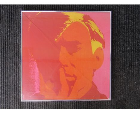 A framed Andy Warhol  'self portrait' art print/poster (glass cracked) 64.5cm x 64.5cm