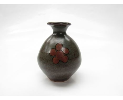 A St Ives Pottery small bud vase, possibly by Bernard Leach. Greenish glaze with iron red spot detail. Pottery seal only. 9cm
