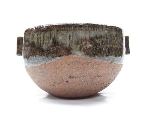 JANET LEACH (1918-1997) (ARR) A St Ives Pottery bowl, the top section dipped in ash glaze, twin lug handles. Impressed potter