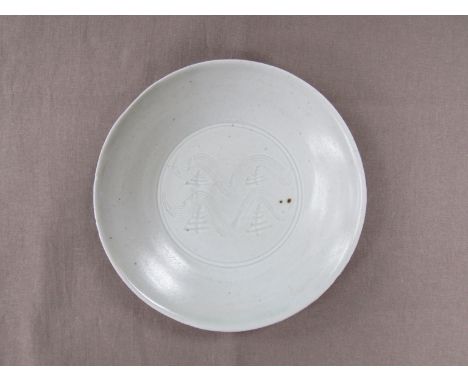 BERNARD LEACH (1887-1979) (ARR) A St Ives Pottery porcelain dish with pale celadon glaze, incised waved lines and tree motif'