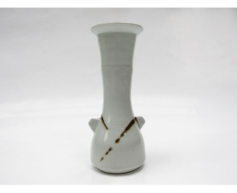 JANET LEACH (1918-1997) (ARR) A St.Ives Pottery porcelain twin lugged vase, Pale Celadon glaze with tenmoku flashes, impresse