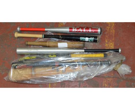 POLICE > 4 baseball bats, a cricket bat, a rounders bat and a child's hockey stick  [VAT ON HAMMER PRICE]
