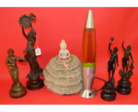 Lava lamp, together with a crinoline lady lamp and 4 spelter figures.