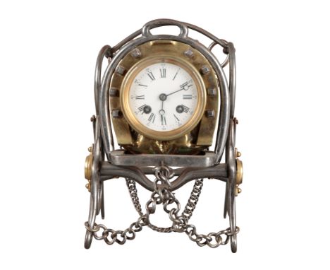 A FRENCH EQUESTRIAN THEMED MANTEL CLOCK created from elements of horse tack including stirrups and bridles, with key-wind mov