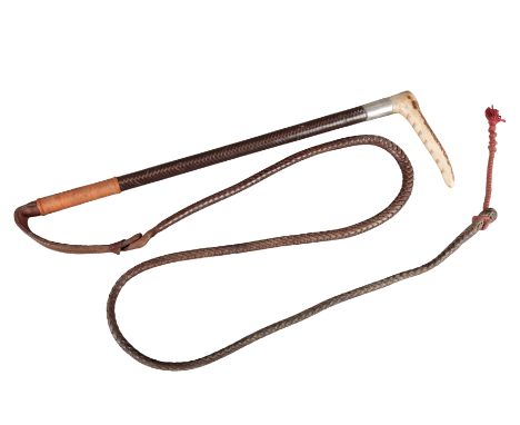 SWAINE, LONDON: A LADY'S HUNTING CROPwith antler handle and hallmarked silver collar, plaited leather shaft and thong, 22cm l