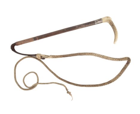A GENTLEMAN'S ANTLER HANDLE HUNTING CROPwith silver collar, plaited leather shaft and leather thong, 48cm long