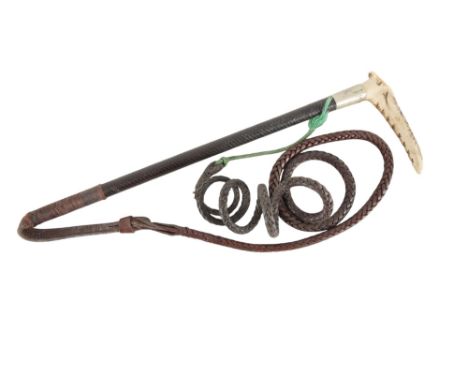 A GENTLEMAN'S ANTLER HANDLE HUNTING CROP BY SWAINEwith plated collar, leather plaited shaft and thong, 48cm long