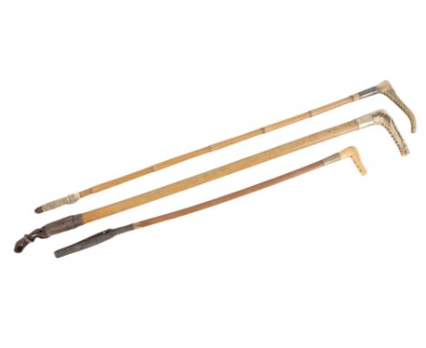 A LADY'S ANTLER HANDLE HUNTING CROPwith silver collar; and two other hunting crops (3)