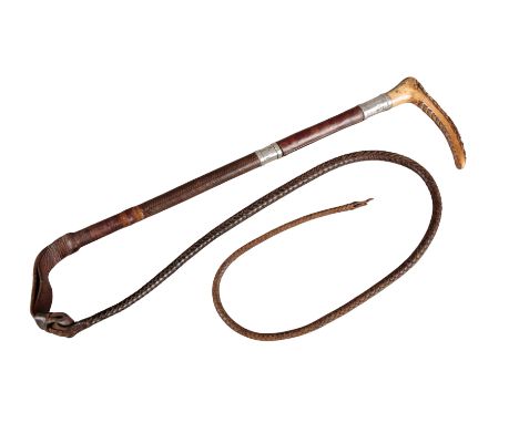 CHAMPNEY & WILSON, LONDON: A GENTLEMAN'S HUNTING CROPwith antler handle and double hallmarked silver collars, leather grip, p