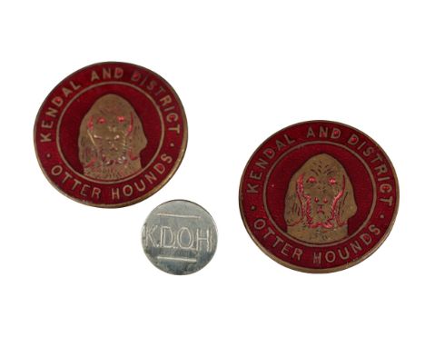 TWO BRASS AND ENAMEL KENDAL AND DISTRICT OTTERHOUND BADGEStogether with one Kendall and District Otterhound cuff button (3)