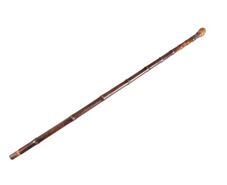 A VICTORIAN BAMBOO HORSE MEASURING STICKwith silver hallmarked collar, lacking ferrule, with spirit levels intact but lacking