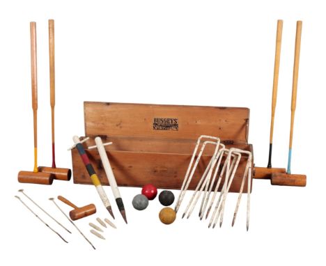 A BUSSEYS' CROQUET SETin the original pine carrying box for four players, with four mallets hoops and balls