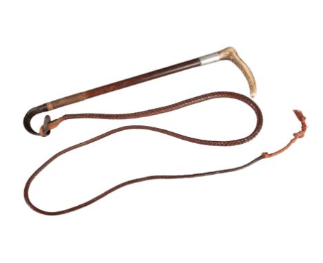 SWAINE, LONDON: A GENTLEMAN'S HUNTING CROPwith antler handle and silver collar with initials "PMP", plaited leather shaft and