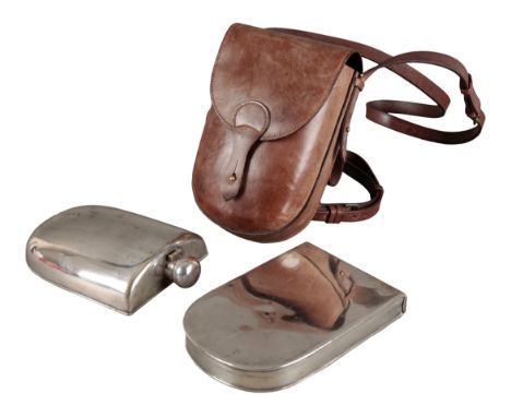 AN EDWARDIAN SECOND HUNTSMAN'S CANTEEN comprising a nickel-plated spirit flask and sandwich tin, in the original leather sadd