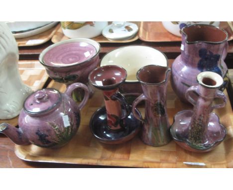 Tray of Torquay pottery Lemon and Crute items on a purple ground with flowers and butterflies to include; large baluster jug,