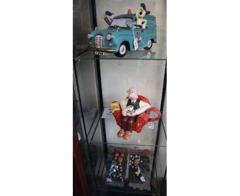 Border Fine Arts a Paul Cardew design A6485 'Wallace in armchair' teapot in original box, together with 'Wallace and Gromit; 