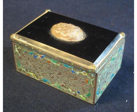 Chinese small engraved white metal foliate decorated rectangular box with hinged cover, the cover of black hardstone with ins
