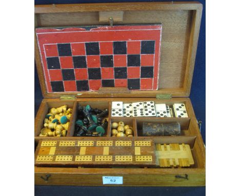 Rectangular mahogany box fitted to the interior as a games compendium and containing; Staunton chess set, draughts, peg board