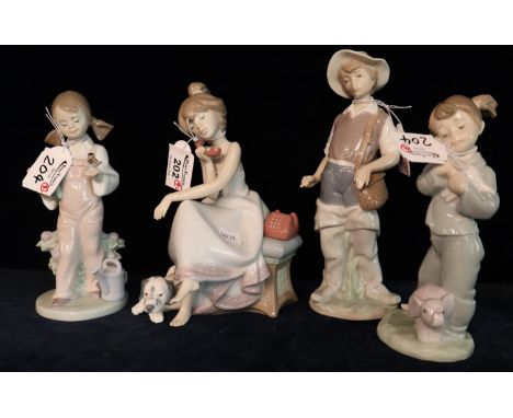 Three Lladro Spanish porcelain figurines, two girls with puppy and bird, together with a Nao Spanish porcelain figurine of a 