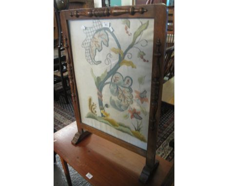 Early 20th Century tapestry firescreen in oak frame depicting squirrel amongst foliage. (B.P. 21% + VAT) 