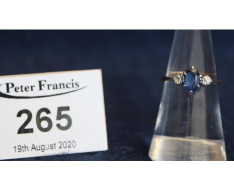 An 18ct gold diamond and sapphire three stone ring. Ring size L, 1.7g approx. (B.P. 21% + VAT) Small diamonds, old rose, cut 