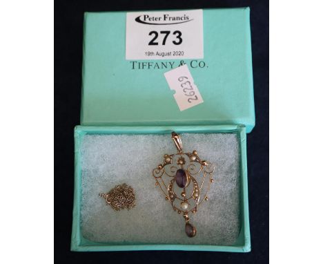 A 9ct gold amethyst and pearl Art Nouveau pendant and chain. (B.P. 21% + VAT) Wear with age, no damage or losses.Items are st