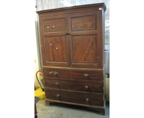 19th Century stained pine press cupboard having associate turned knob handles on bracket feet. (B.P. 21% + VAT)Condition: Dam
