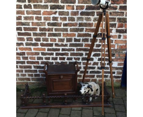 Telescope on tripod, carved wooden pig, piano stool & 1930's fender with barley twist rail
