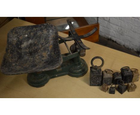 Pair of scales and various weights