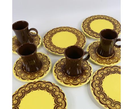 BJORN WIINBLAD for ROSENTHAL - 1970s, 4 trios, waisted loop handled cups on flat plates and saucers, each with maker's markSo