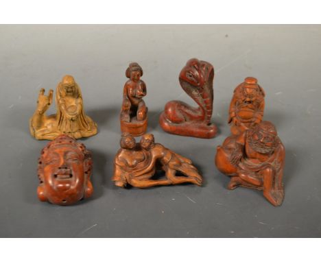 A collection of carved wooden Japanese netsuke (7)