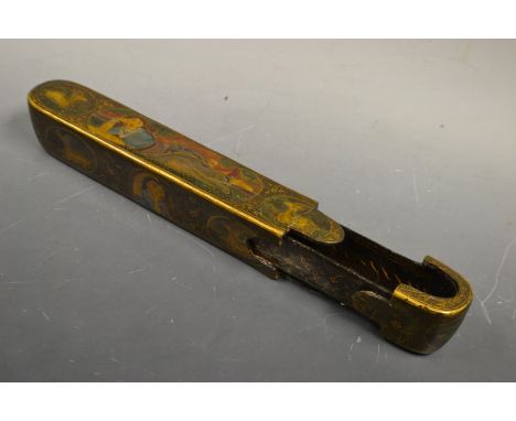 A 19th century Anglo-Indian papier mache pen/quill caddy, decorated with reclining court beauties and gazelles, 23.2cm long